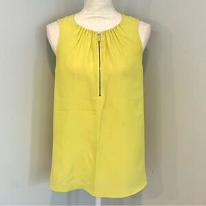 Yellow Sleeveless Blouse with Modern Zipper Detail